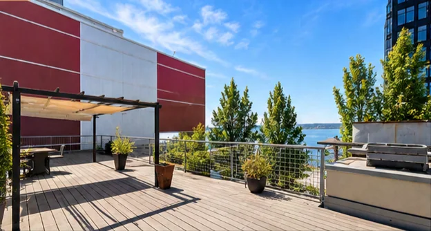 Rooftop deck with a pergola and a view of Elliott Bay.